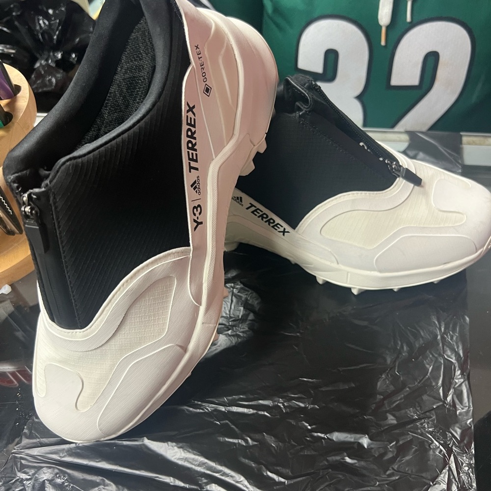 Size 8 men adidas colors white and black. They have minor imperfections